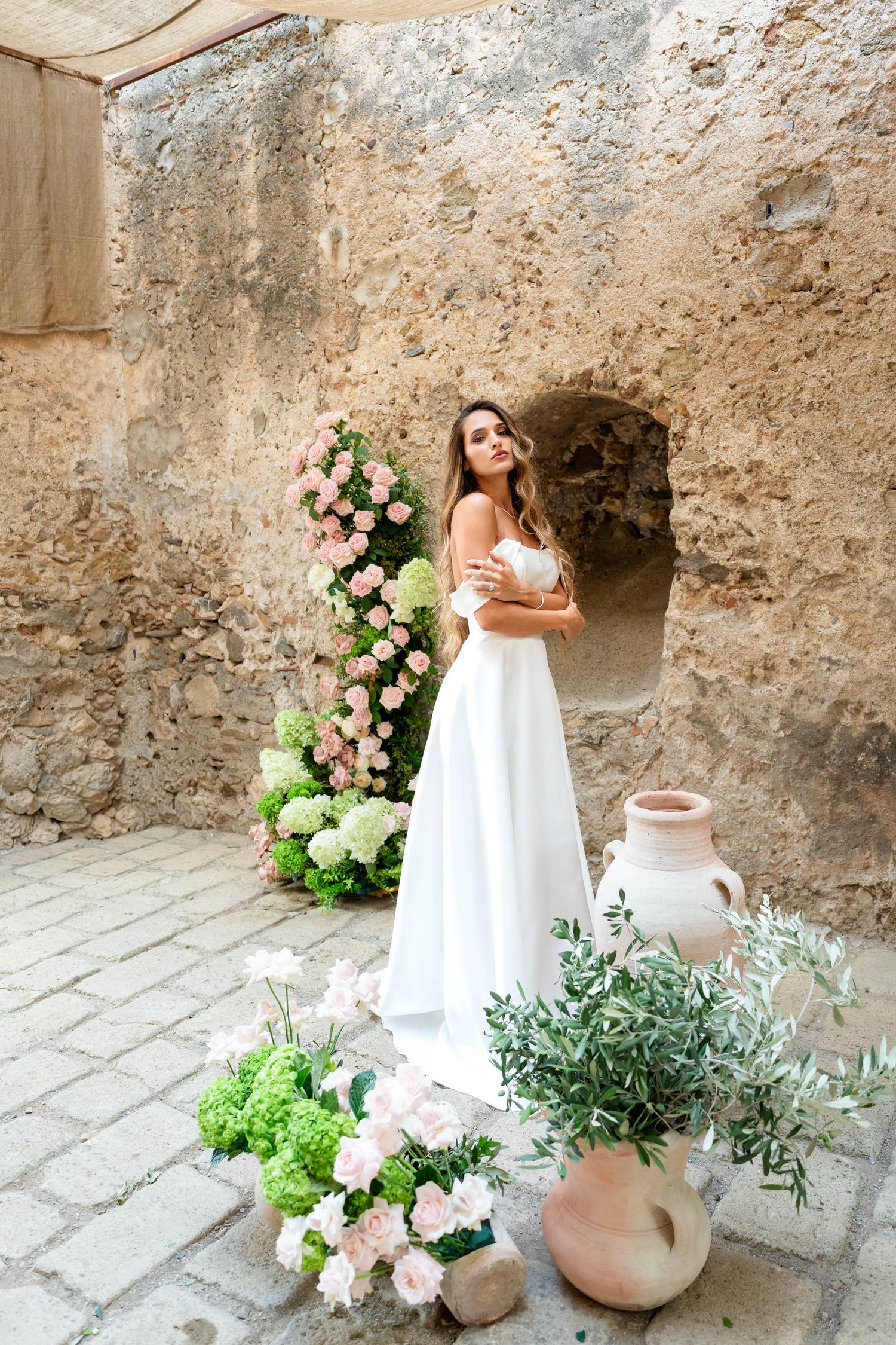 Editorial wedding portrait in Puglia countryside with golden light