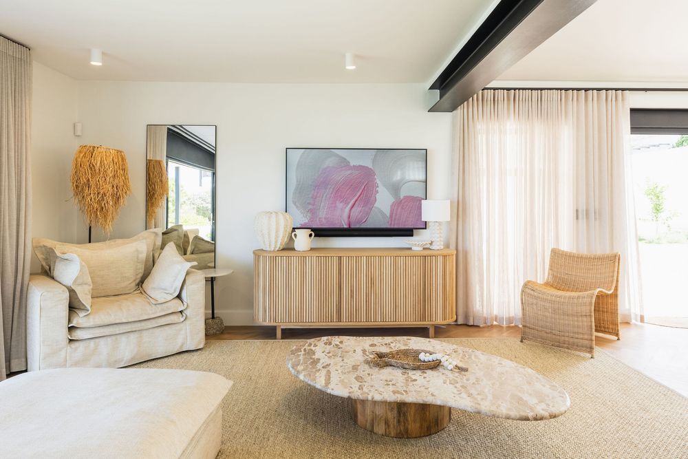 Contemporary beach house lounge with indoor-outdoor flow and clean design