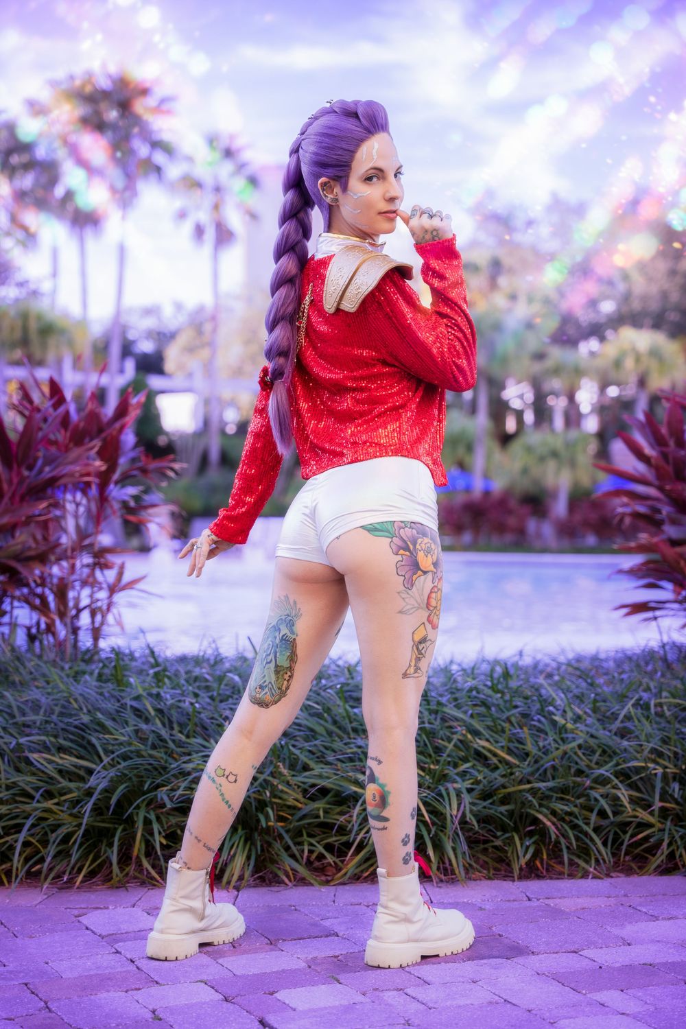 Rumi cosplay from K-pop Demon Hunters in a vibrant setting.