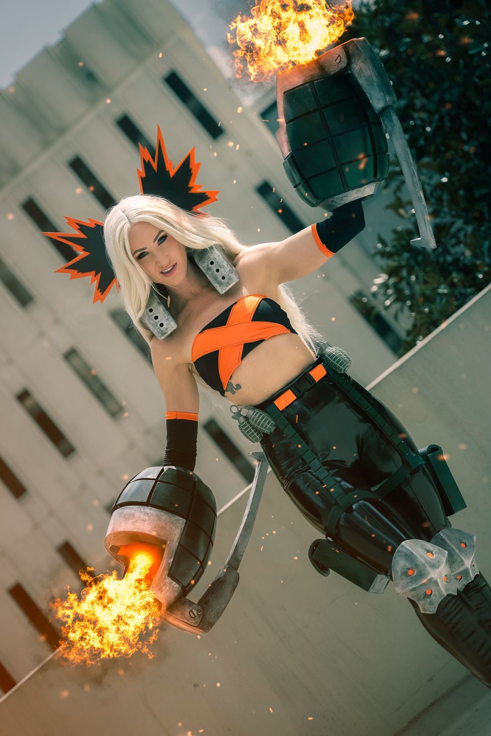 Cosplay portrait of Katsuki Bakugo from My Hero Academia with explosive effects.