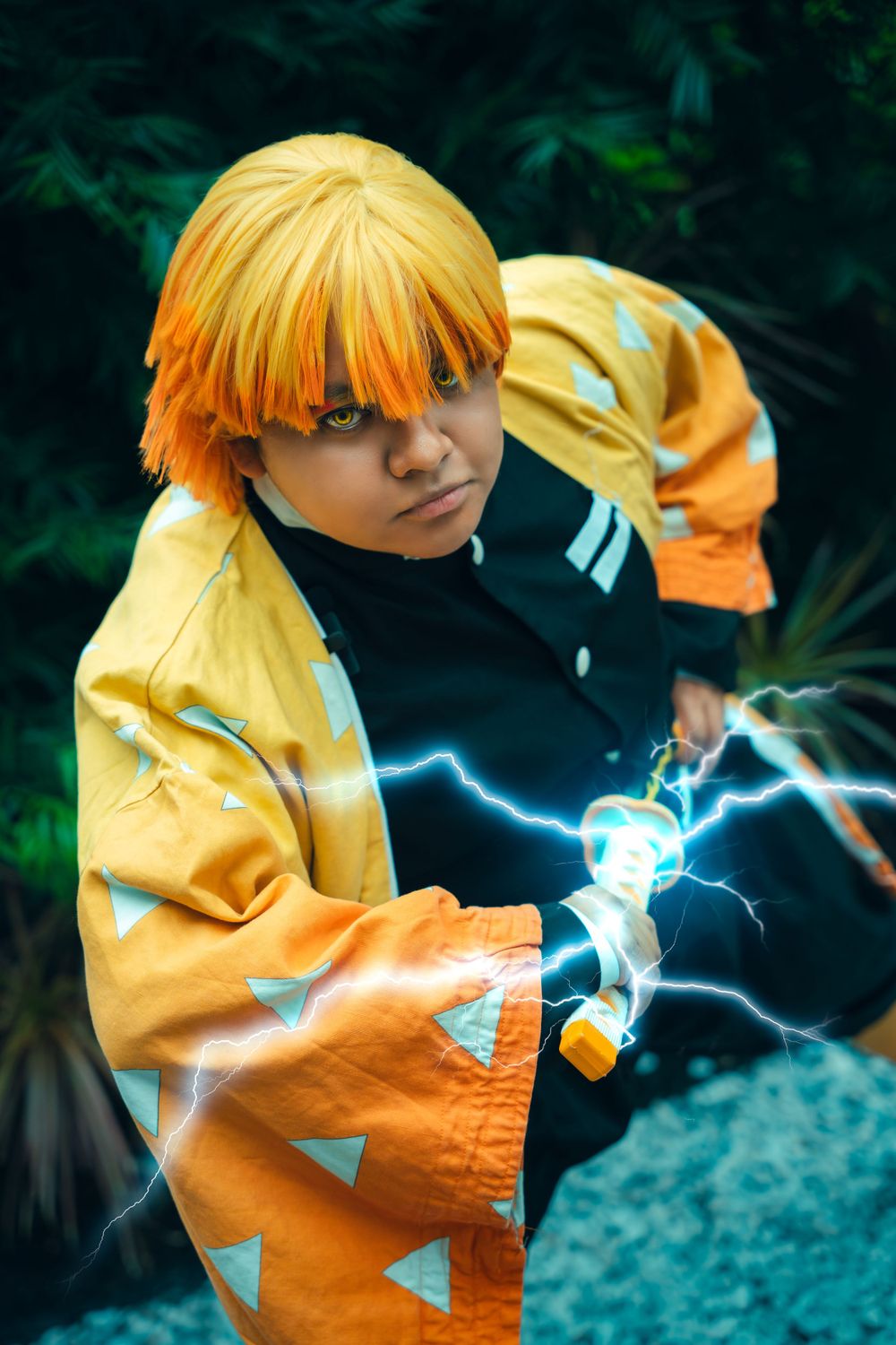 Cosplay portrait of Zenitsu from Demon Slayer with lightning effects.