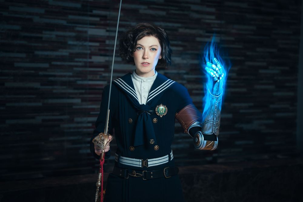 Pinocchio cosplay from Lies of P holding glowing blue Legion Arm energy.