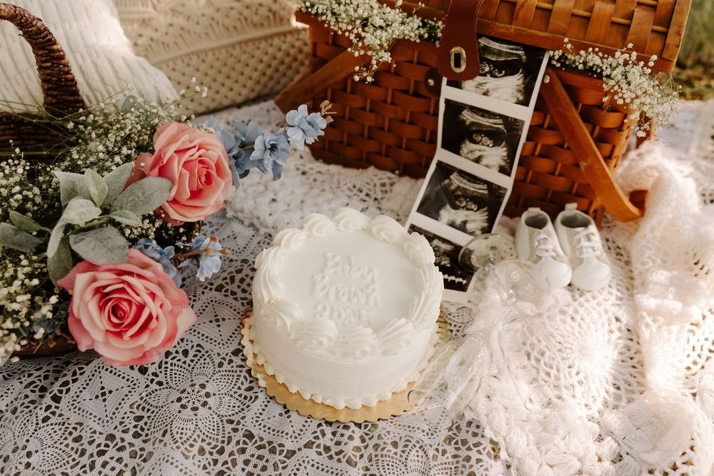Delicate pink roses and lace doilies create an elegant vintage-inspired flat lay composition.