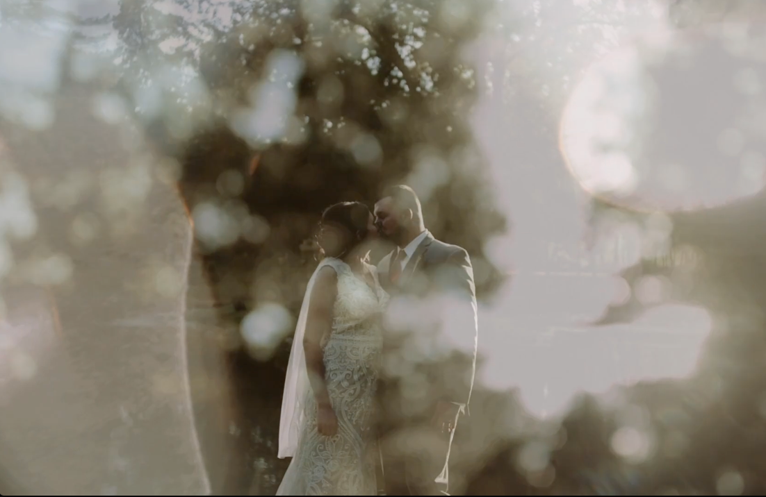 A dreamy, ethereal double exposure photograph showing a silhouette against a soft, bokeh-filled background.