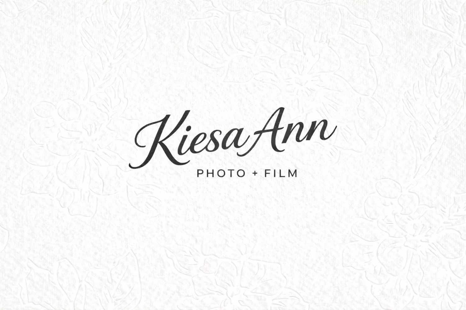 A simple black and white film strip design with decorative text elements.