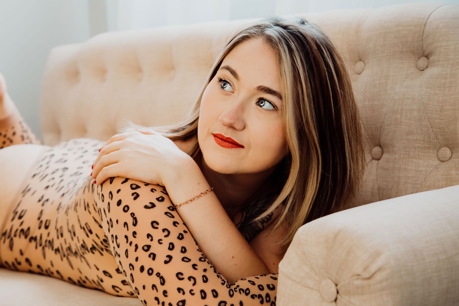 A boudoir portrait with woman in cheetah print