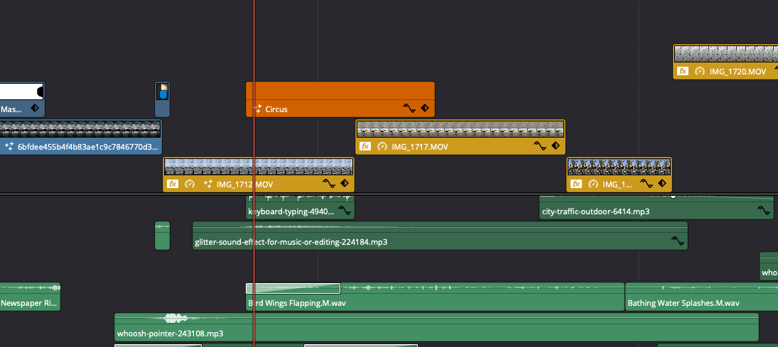 Video editing timeline interface showing multiple colored tracks and segments.