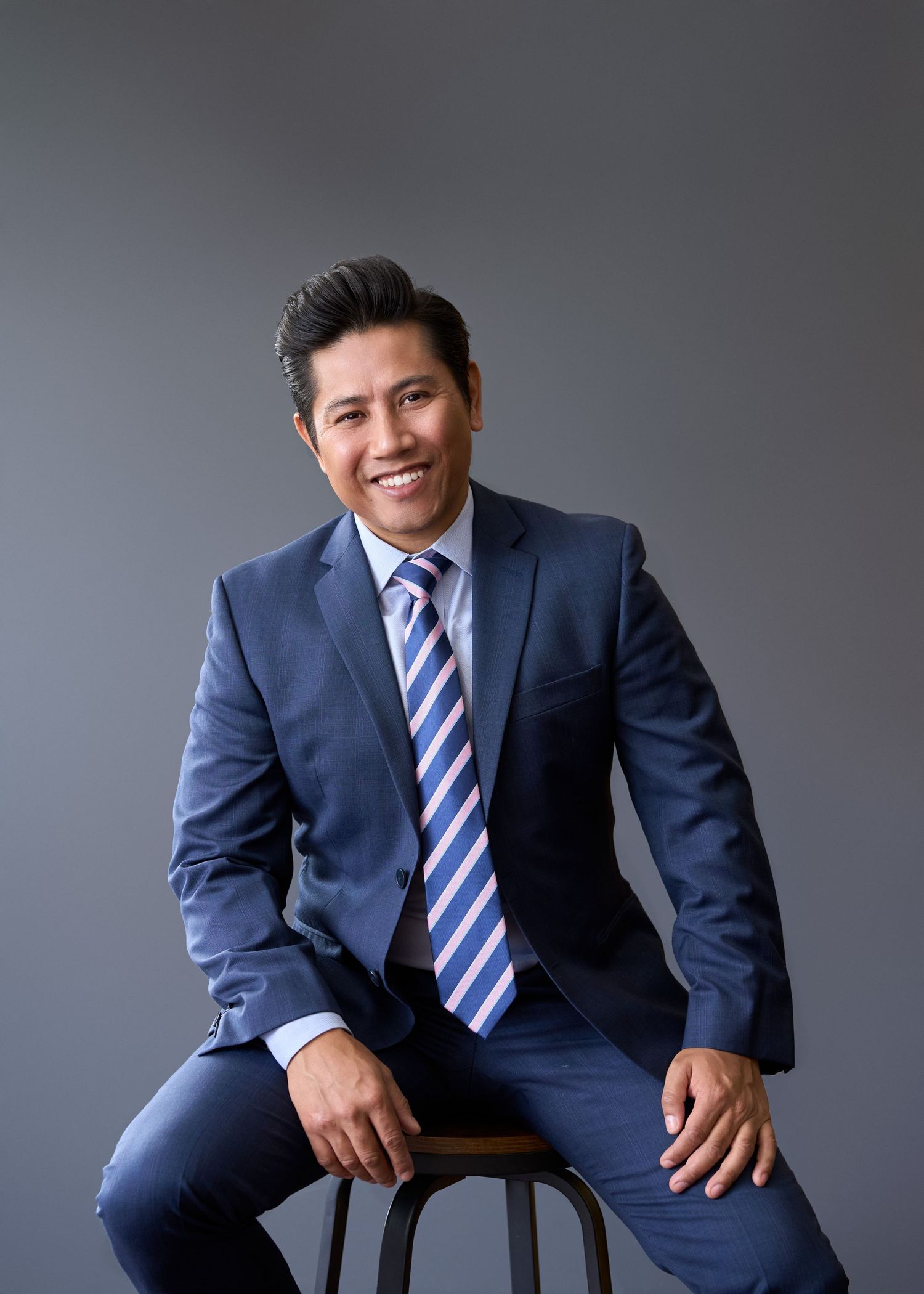 Male corporate headshot in traditional portrait