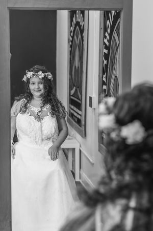 daughter of bride wearing wedding dress. Dallas Fort Worth Wedding Photographer. North Texas Wedding. Sentimental wedding memories