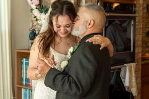 Close up of a father-daughter dance during an emotional wedding. Fort Worth Dallas Texas Wedding. North Texas Wedding. Bride and dad dance
