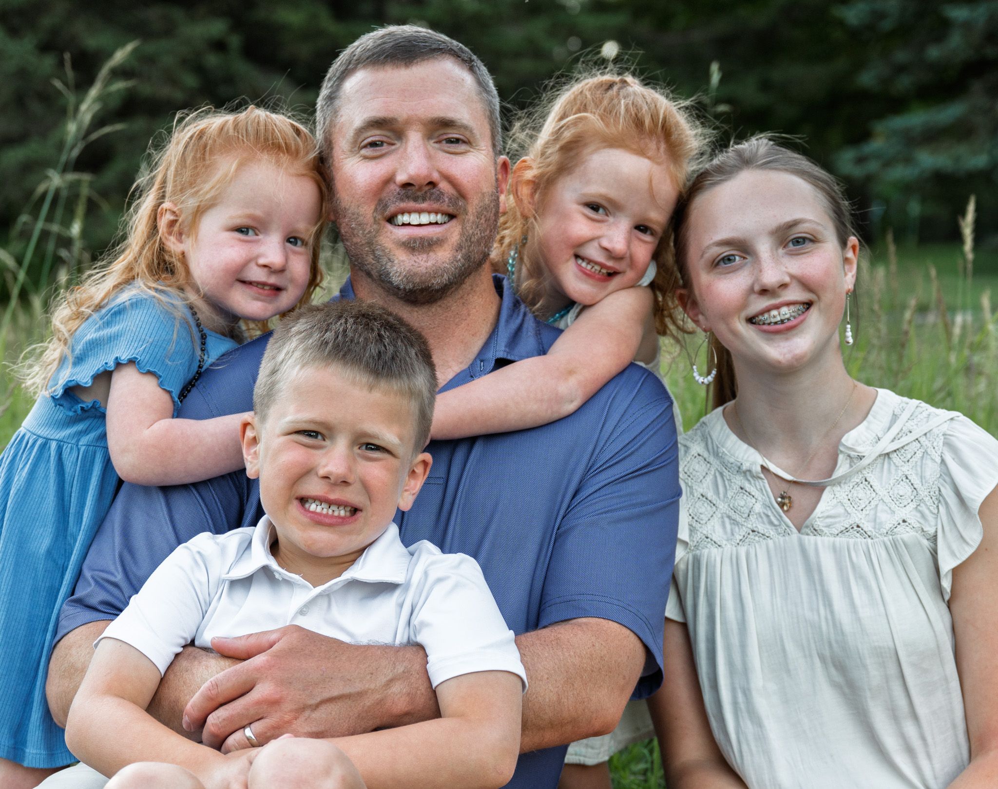 A dad with his children.