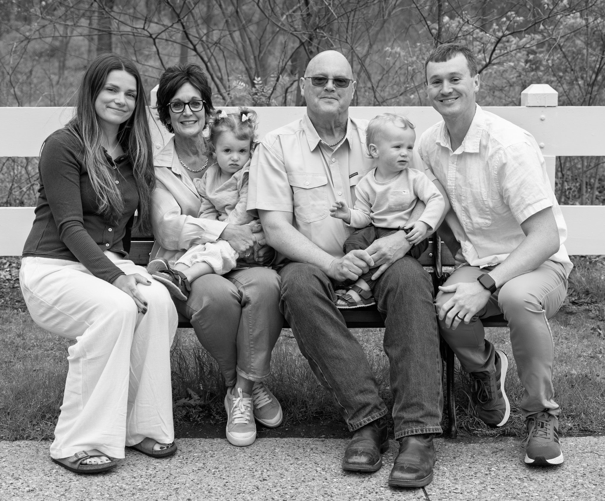 Multi generational family in black and white.