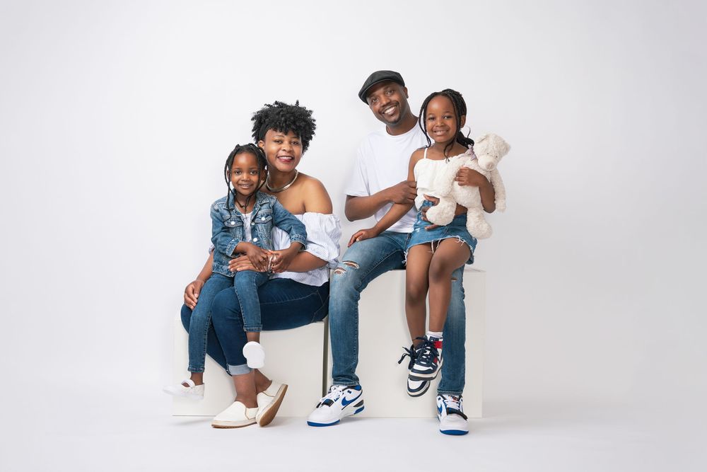 Natural family photography session with modern bright studio styling.