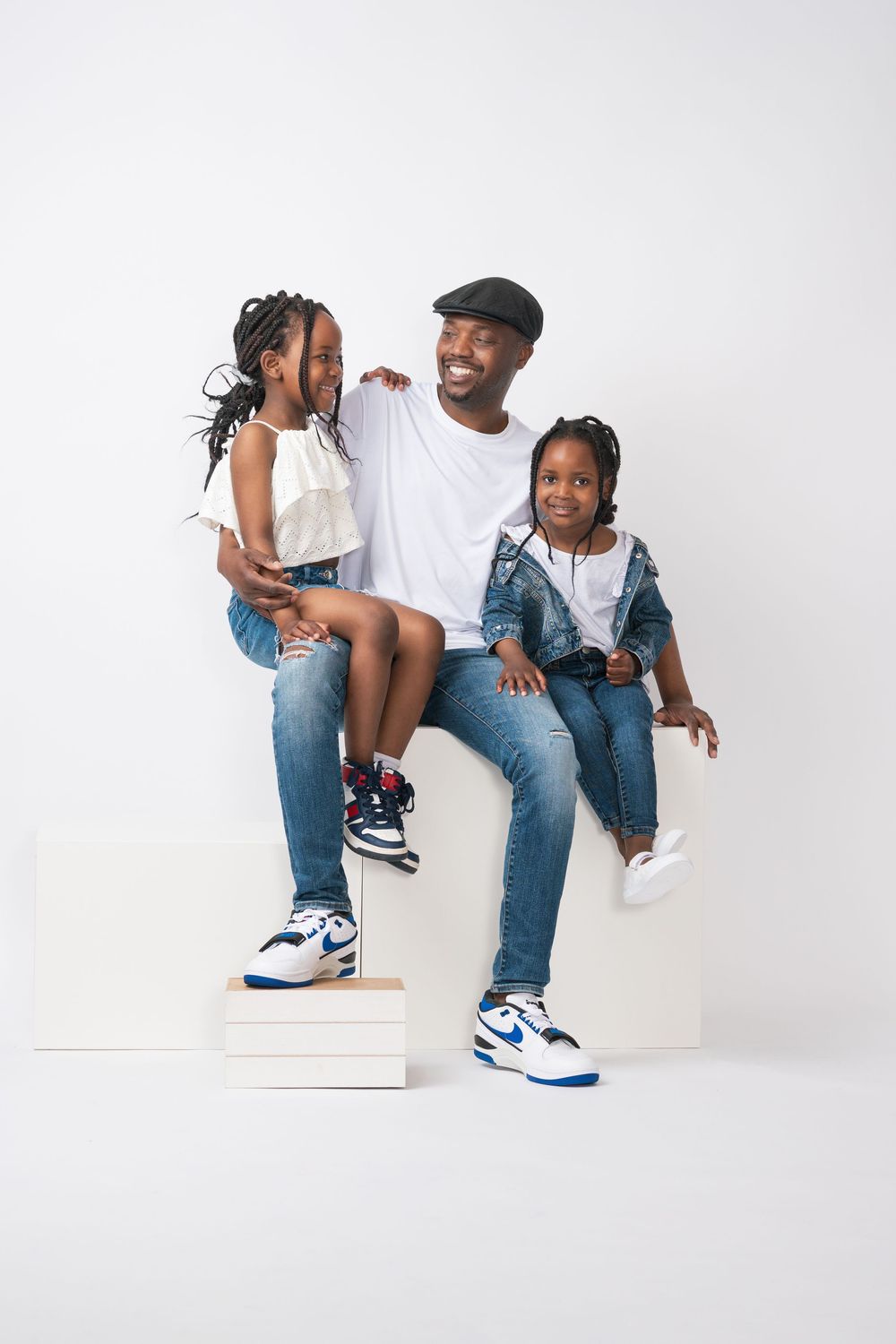 Father and children portrait session photographed in a professional studio near Glasgow.