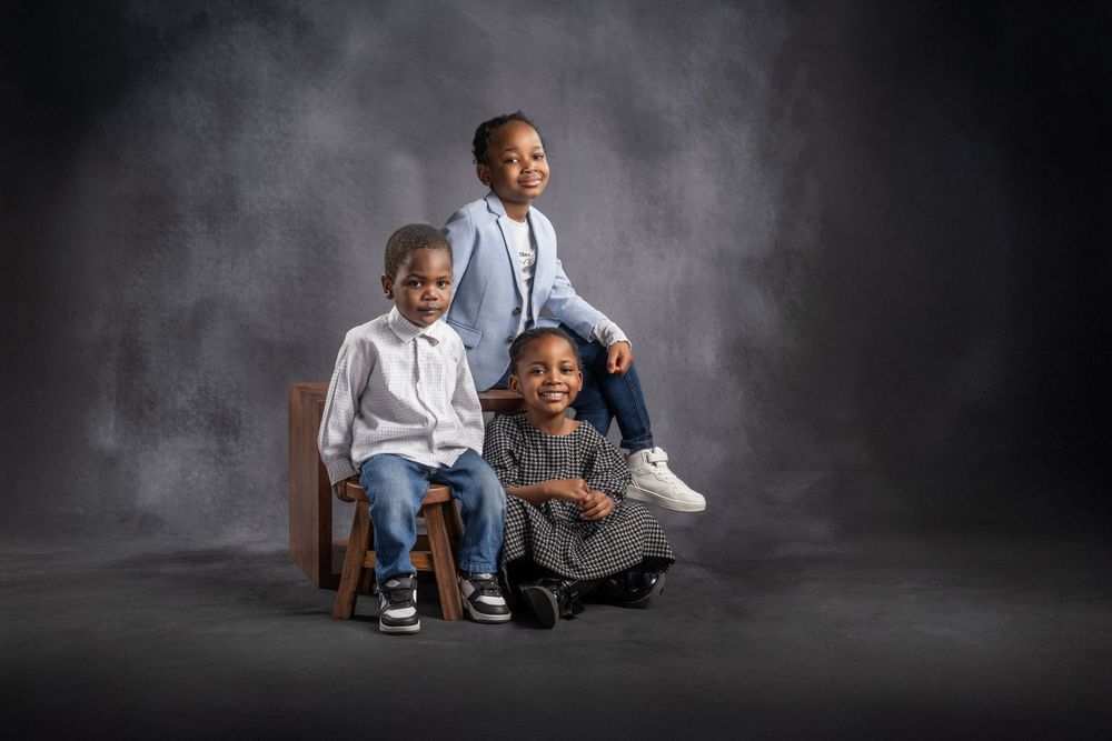 Fine art children portrait photographed in dark studio setup near Glasgow.
