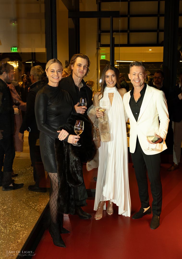 Guests attending a luxury fashion event at Caymus Vineyards photographed by Raymond C. Hansell Photography.