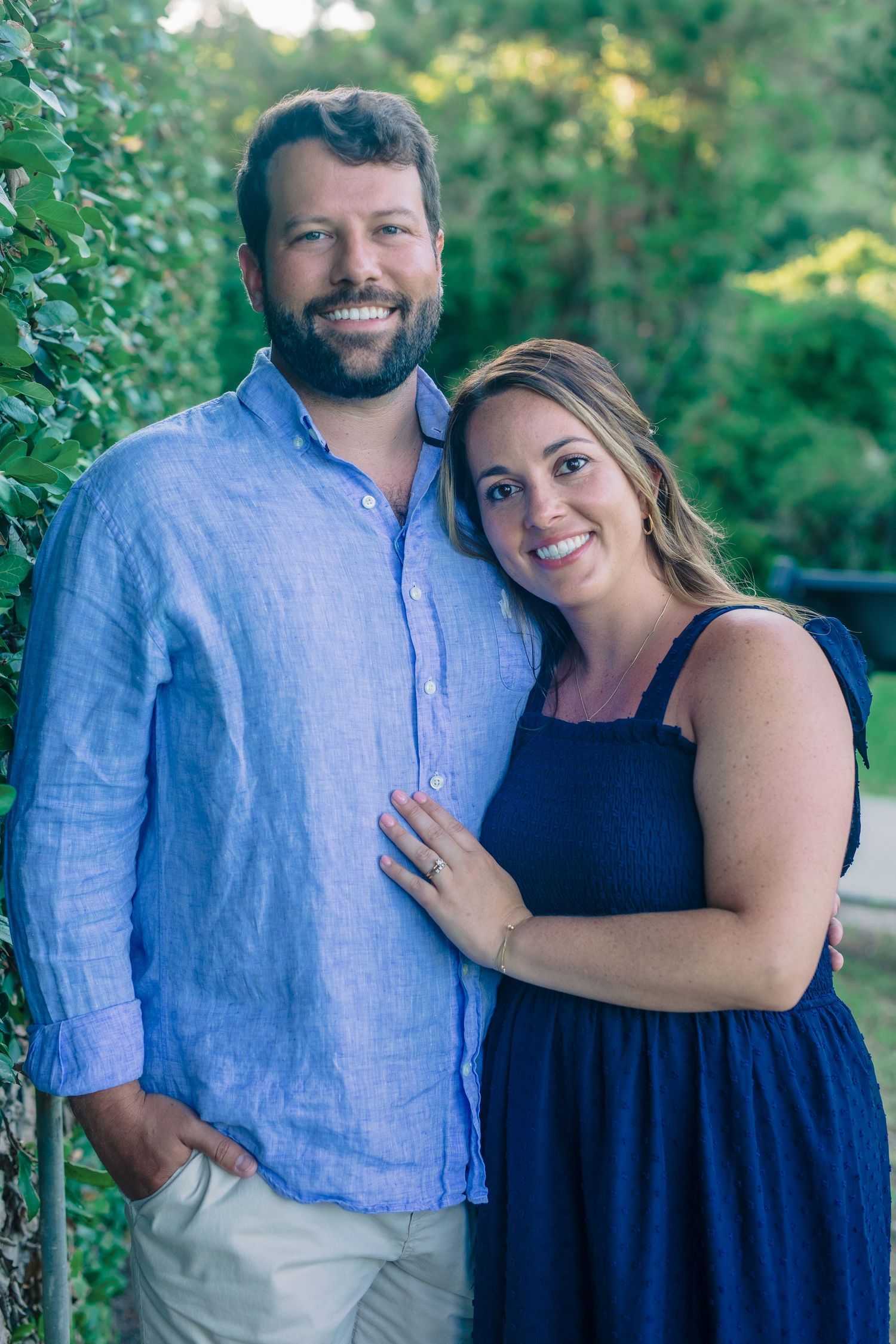 Happy couple portrait smiling together outdoors in a natural setting. Amherstburg photographer.