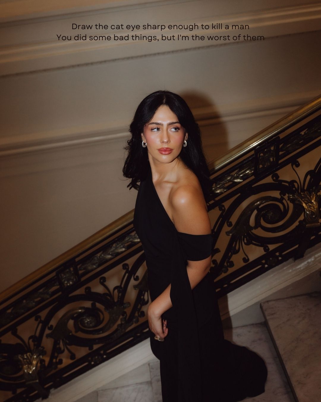 Woman in a black off-shoulder gown on a staircase with a Taylor Swift lyric text overlay.