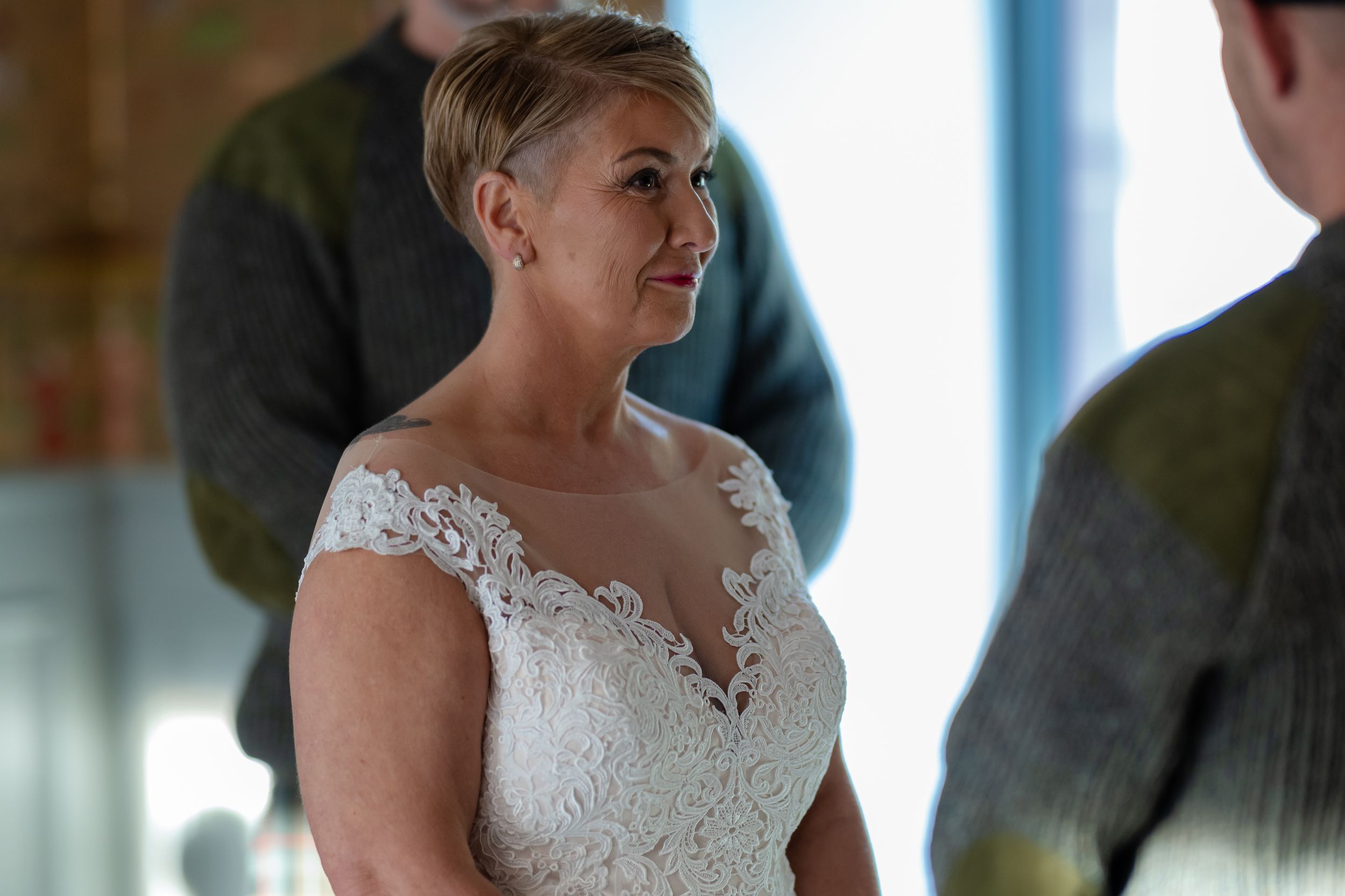 bride looking at her groom at dalkeith country park, Edinburgh