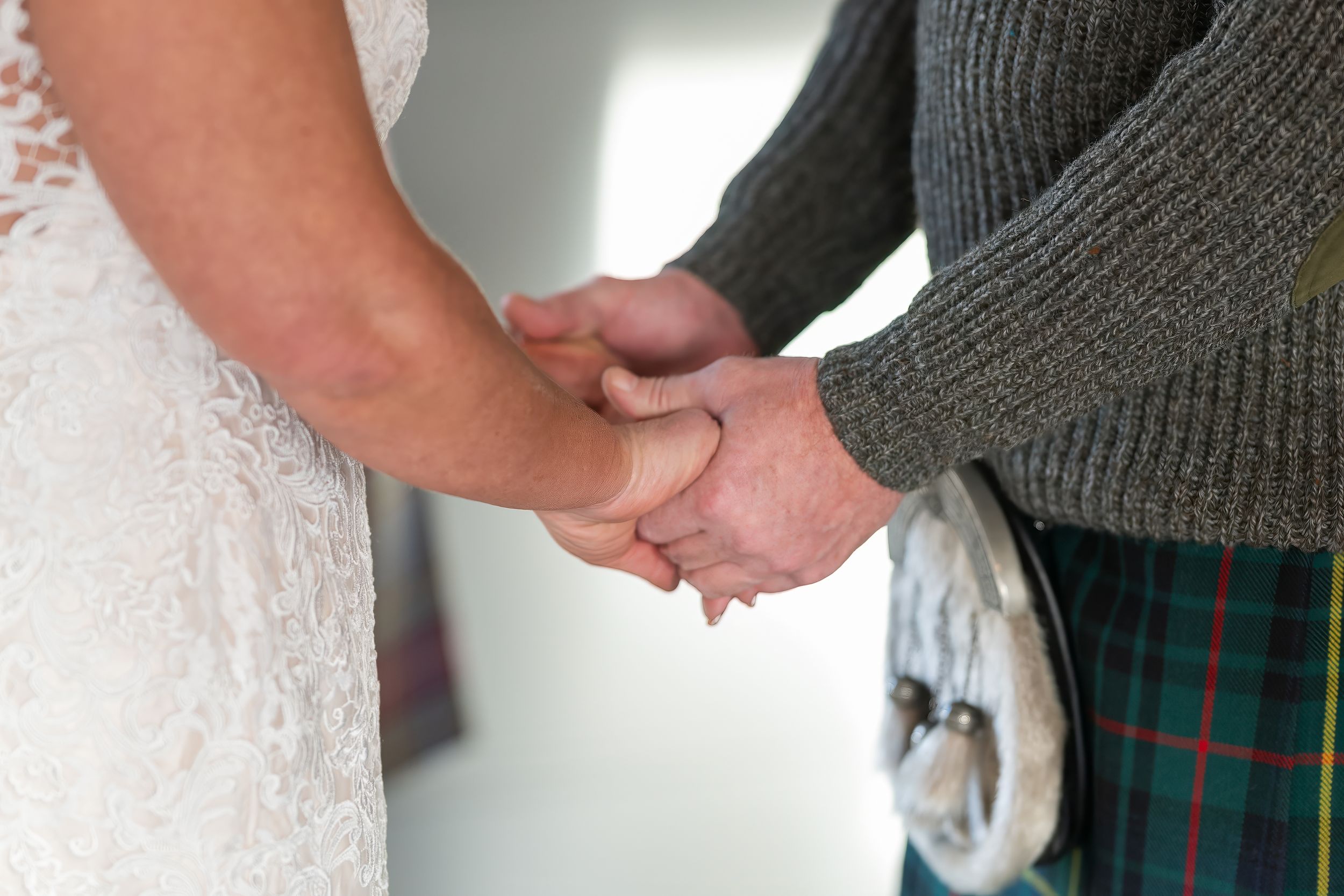bride and groom hold hands dalkeith country park, Edinburgh