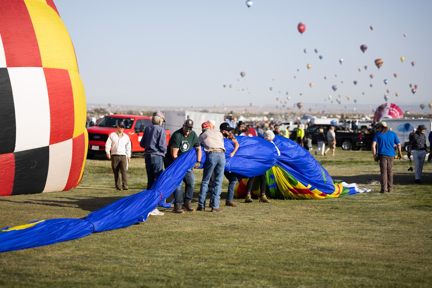 Packing up the hot air balloon in Albuquerque by Memorari Portrait