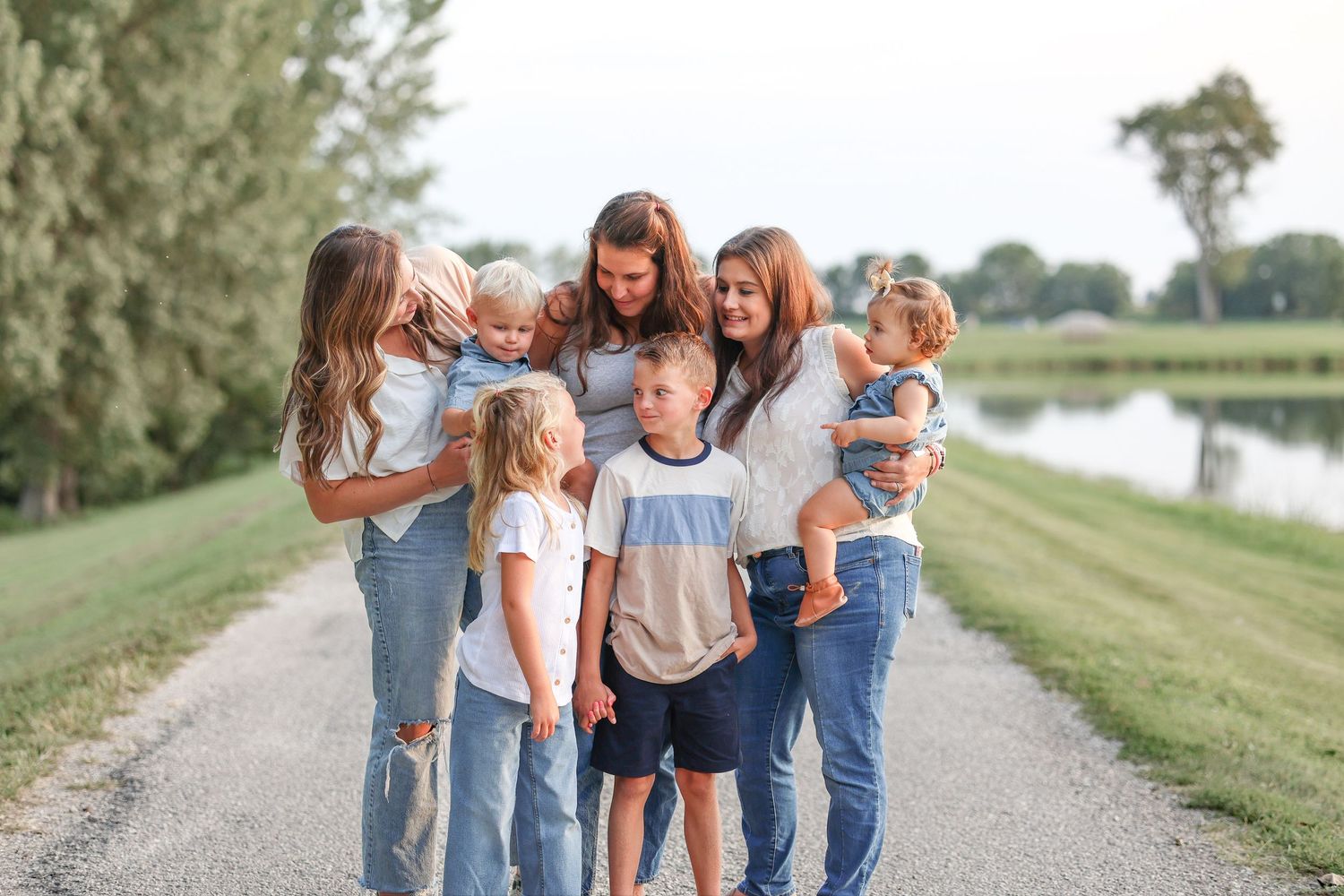 Central Illinois photographer captures extended family together smiling during a family session in Williamsville, IL