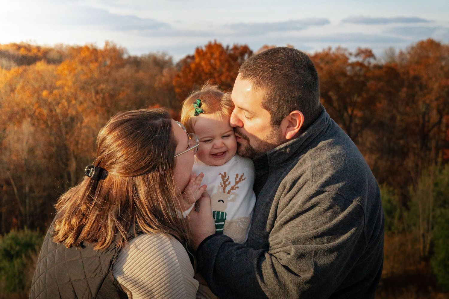 A series of candid family moments captured during a golden autumn sunset in a park setting.