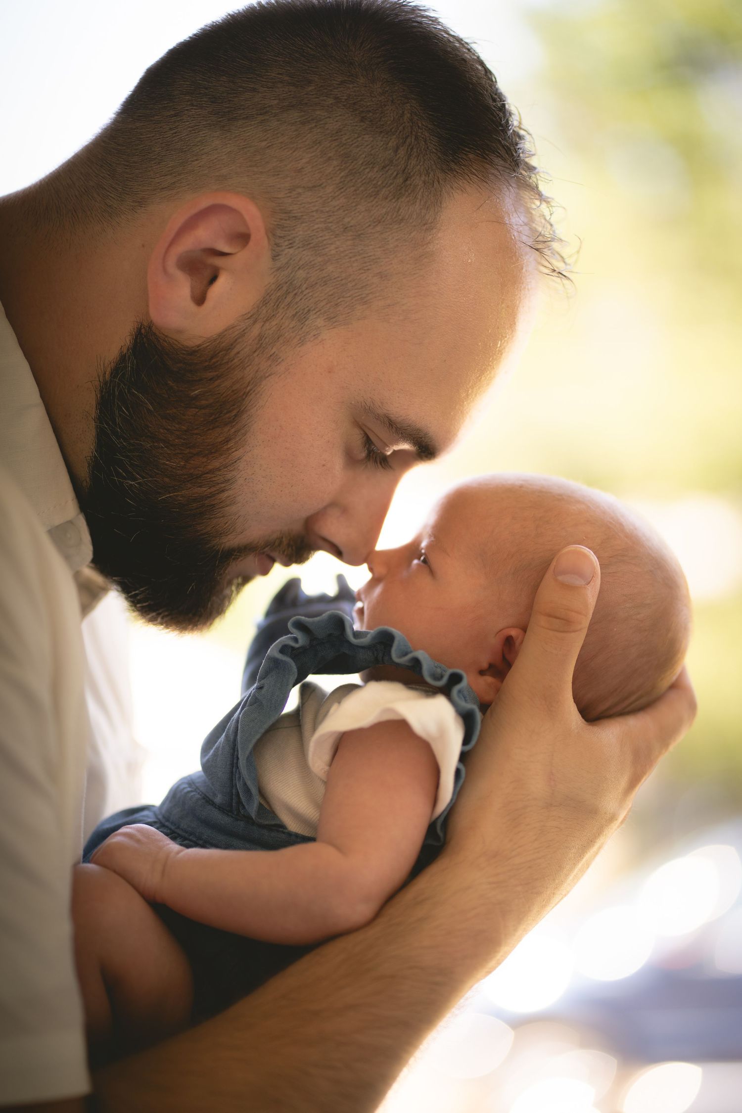 A tender moment captured in multiple frames showing gentle embraces and loving interactions against a soft blurred background.