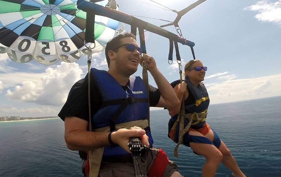 Maggie adventuring with husband in Florida, parasailing.
