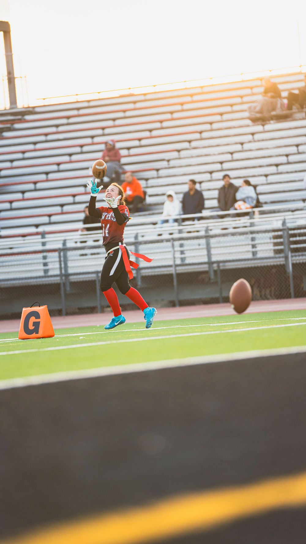 Girls flag football player making a catch