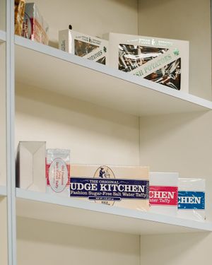 Retail shelf displaying Fudge Kitchen branded products and packaging.