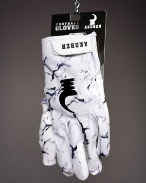 White marble pattern football glove with black accents displayed against dark background.