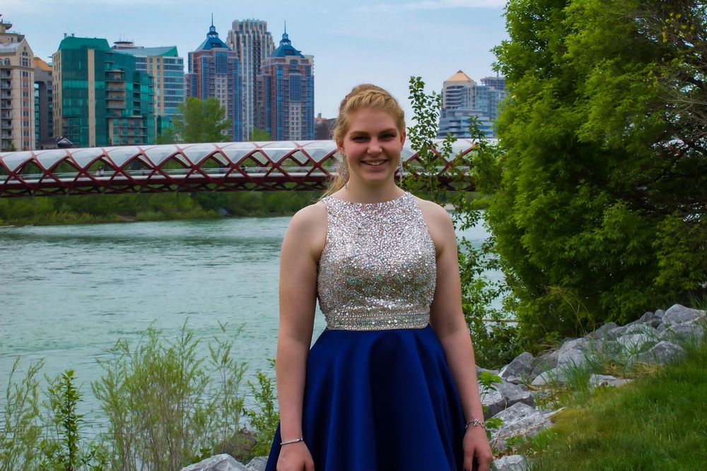 a grad near a bridge over a river.