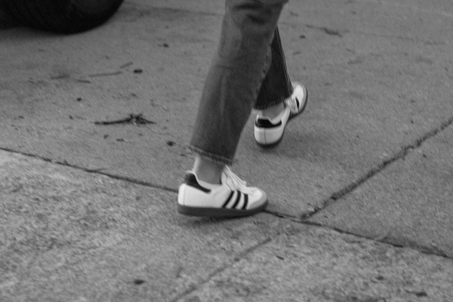 Black and white street photography series showing casual sitting poses. Chattanooga Senior Photographer