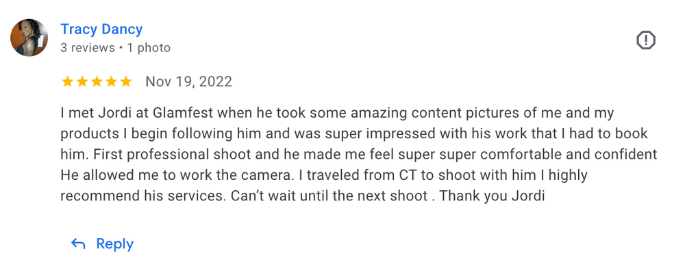 A customer review screenshot praising photography services for clothing and product photos.