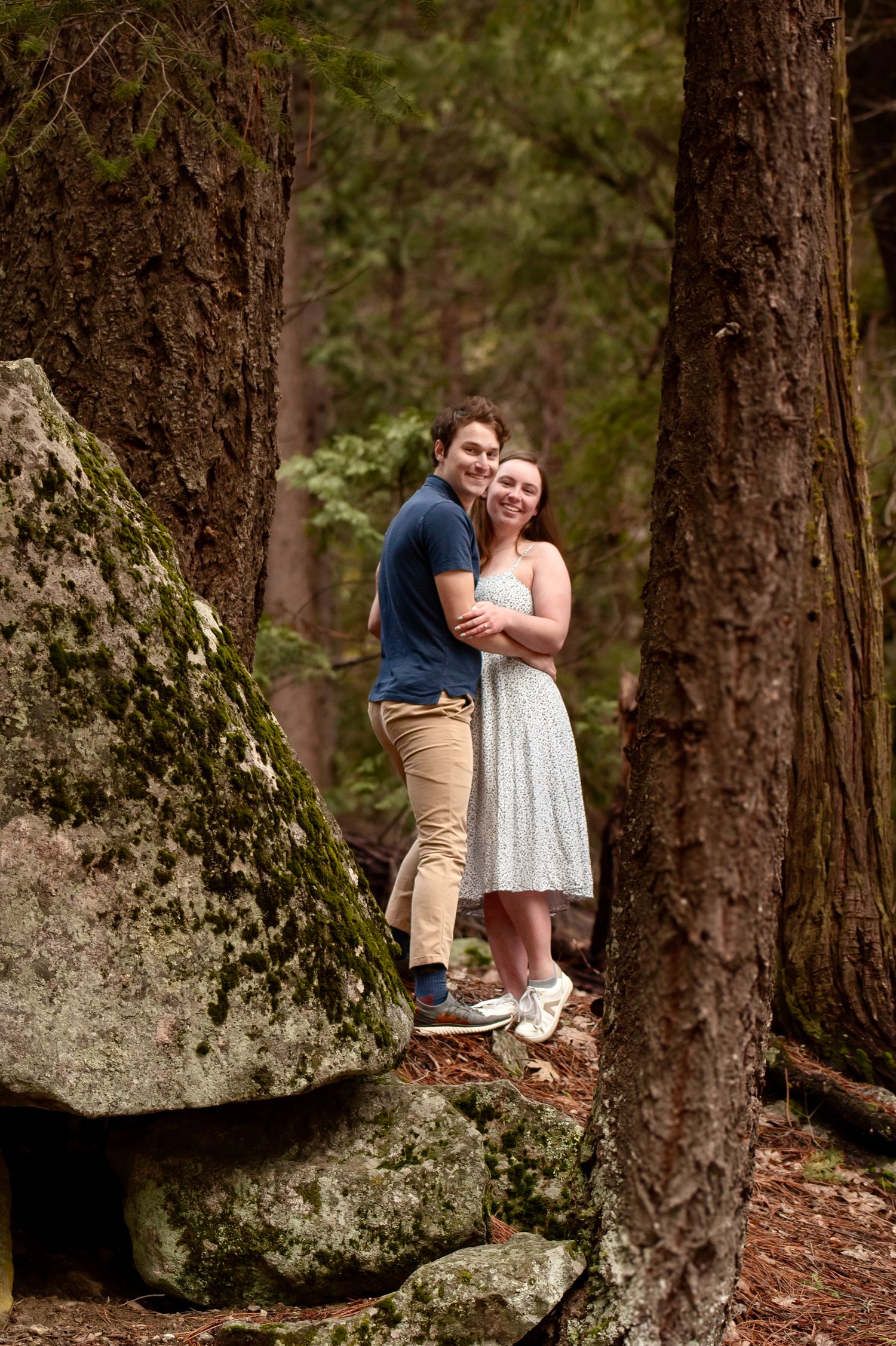 A newly engaged hiking couple at Mirror Lake, Yosemite