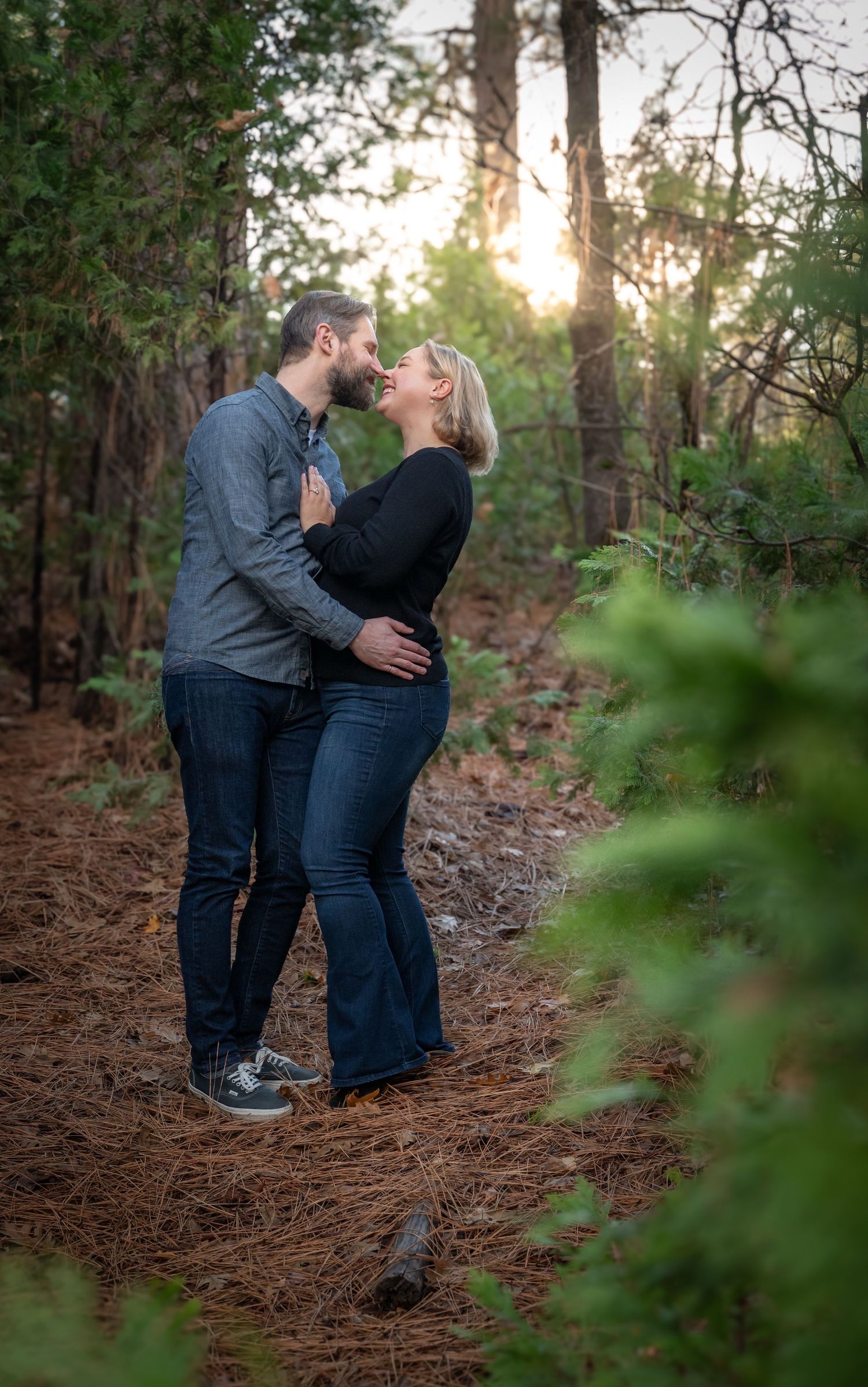 A couple portrait in the woods and forest of Bass Lake, California