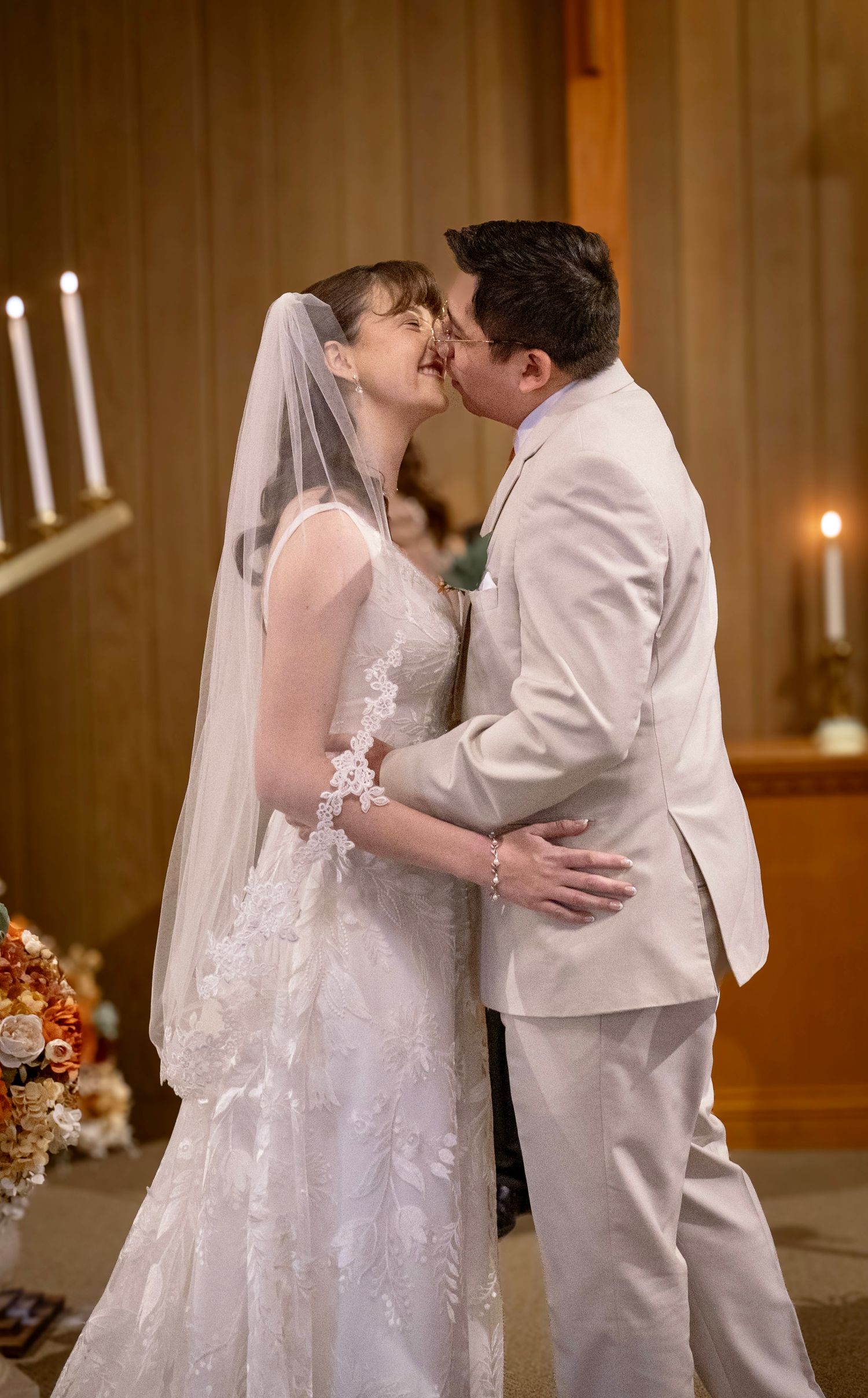 A bride and groom kissing at Yosemite Chapel