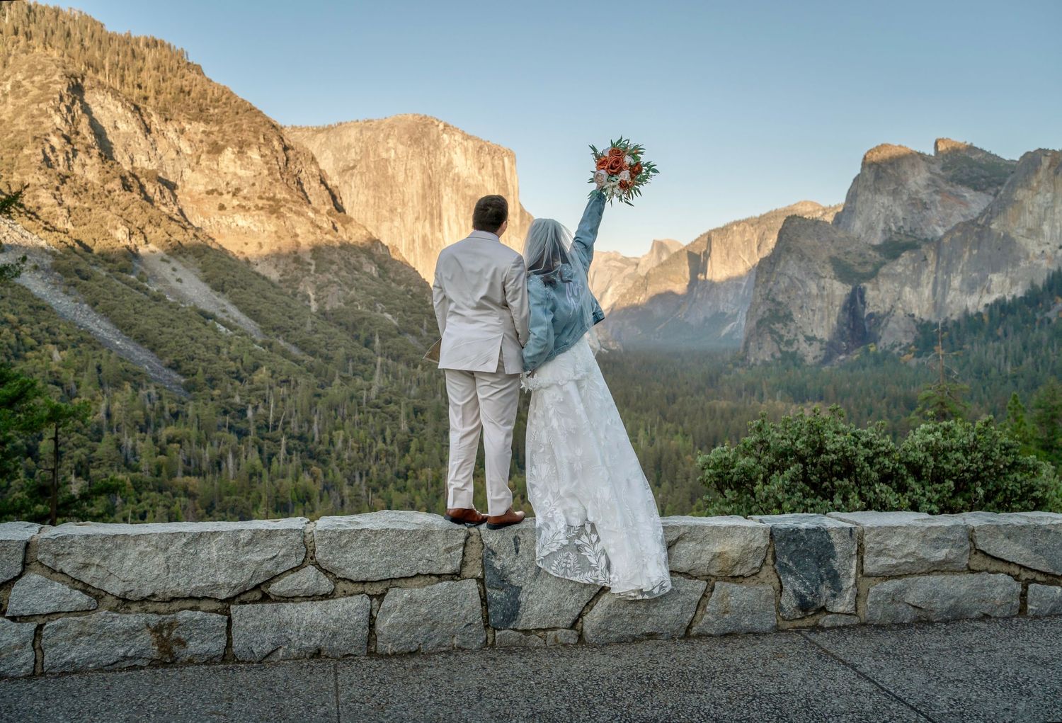 A bride and groom eloping in front of Tunnelview, Yosemite, California