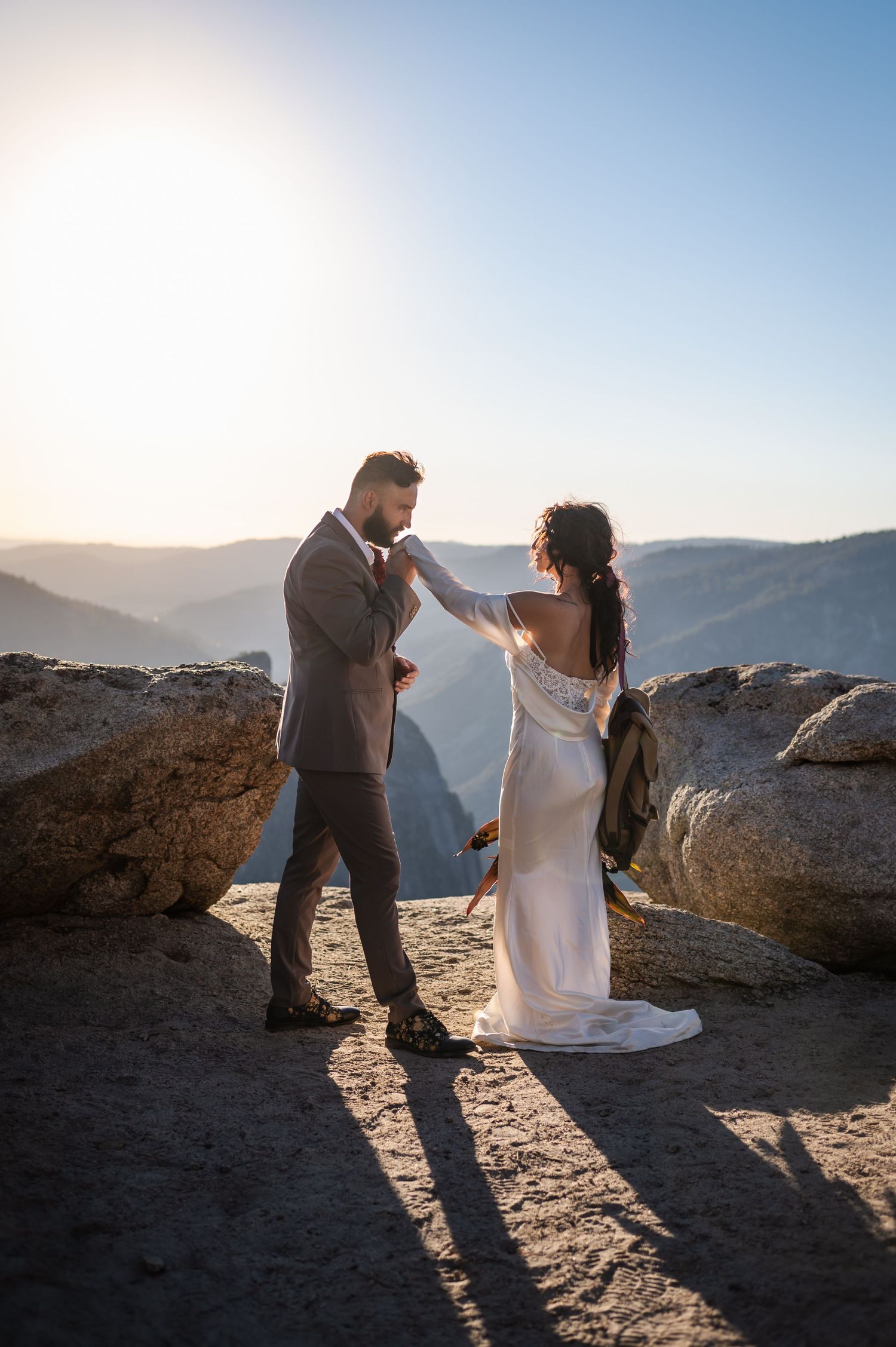 An elegant editorial couple on Taft Point, Yosemite