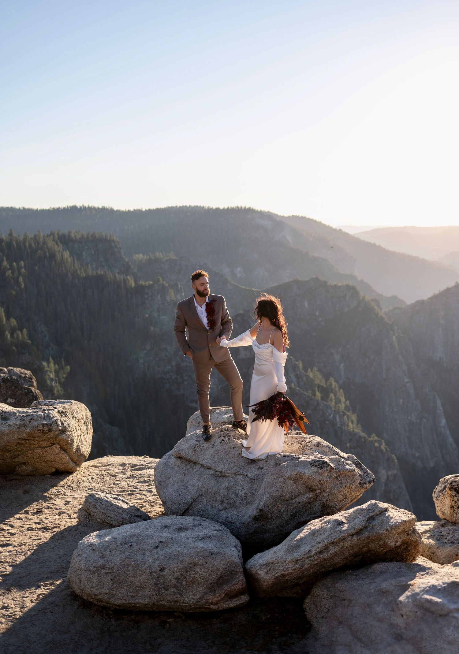 An elegant editorial couple on Taft Point, Yosemite