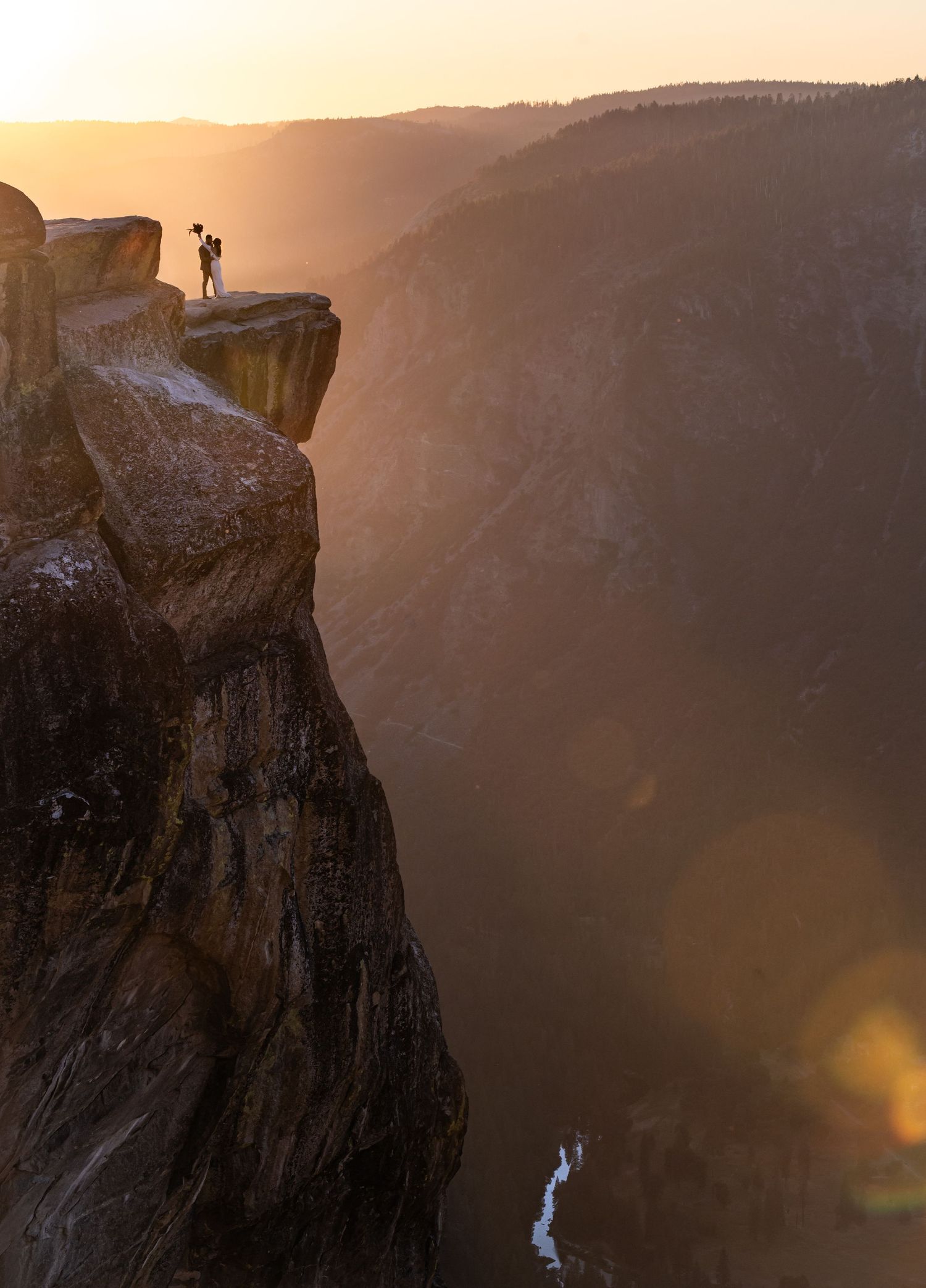 An elegant editorial couple on Taft Point, Yosemite