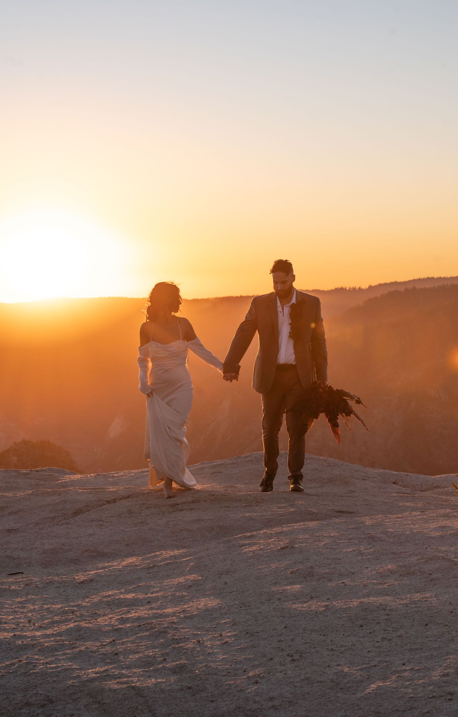 An elegant editorial couple on Taft Point, Yosemite