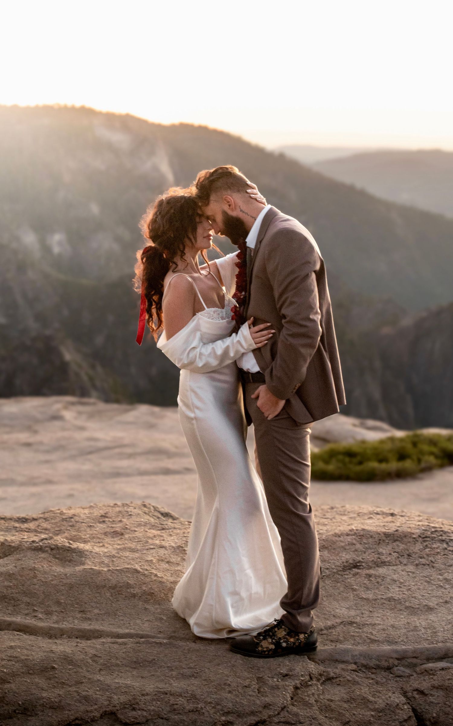 An elegant editorial couple on Taft Point, Yosemite
