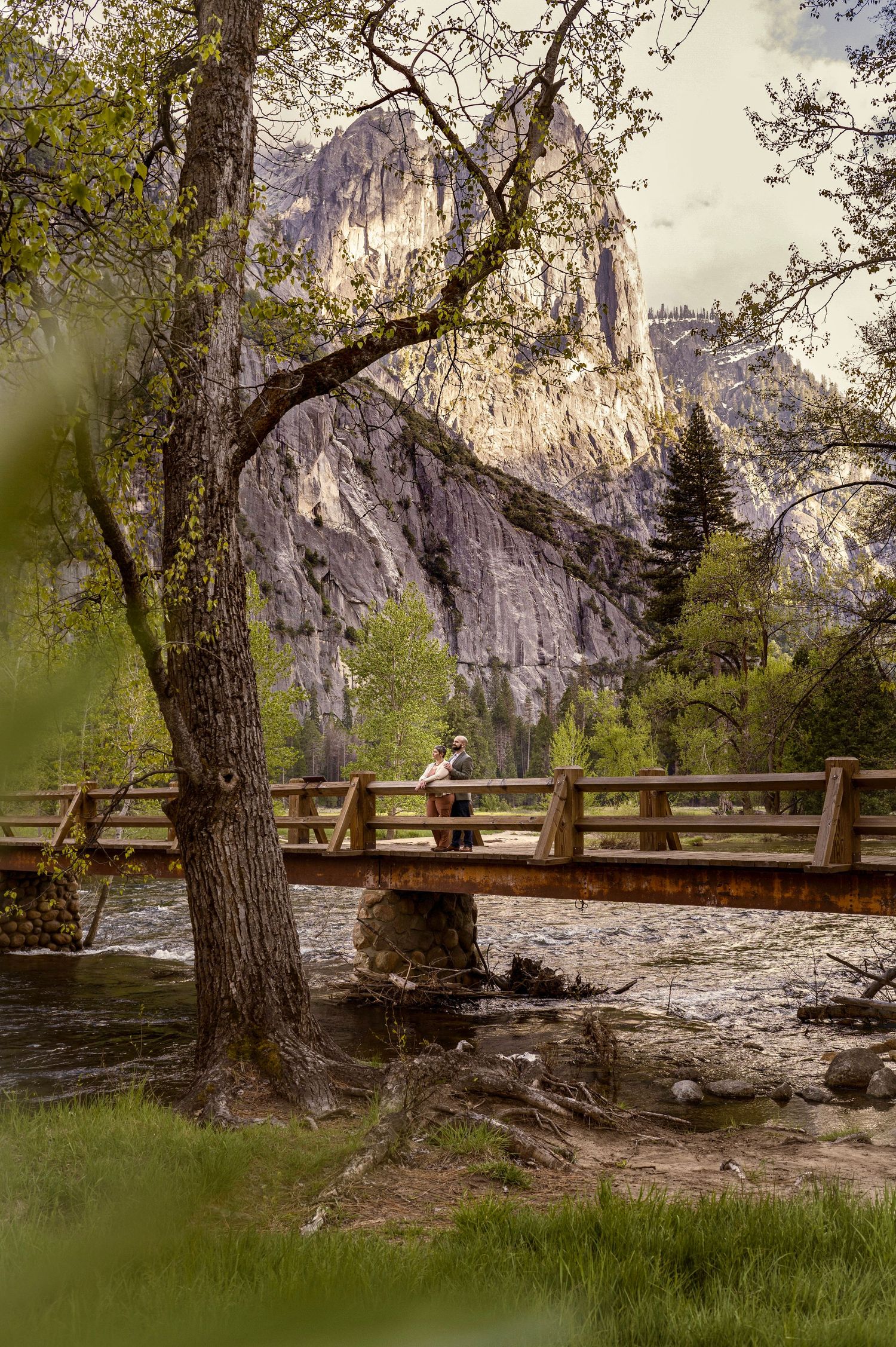 A couple at Sentinel Bridge, Cook's Meadow, Yosemite