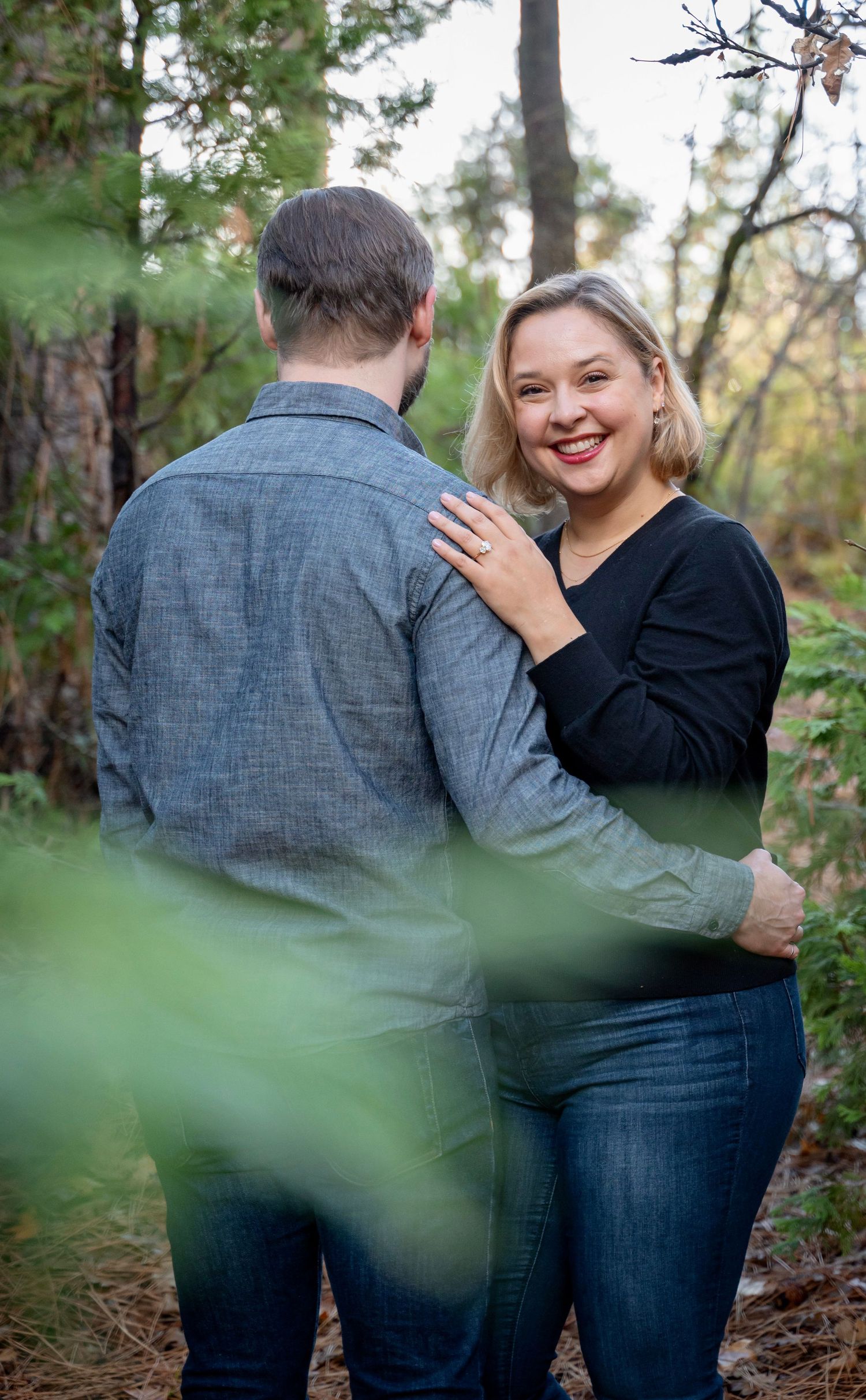 A couple portrait in the woods and forest of Bass Lake, California