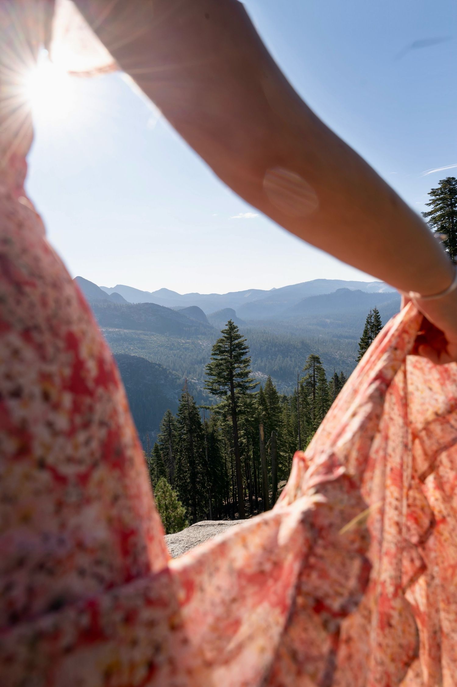 a beautiful engaged couple with Yosemite as a backdrop
