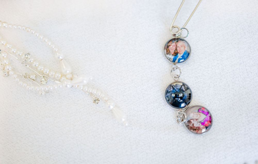 Delicate jewelry pieces featuring colorful round pendant necklaces against white background.