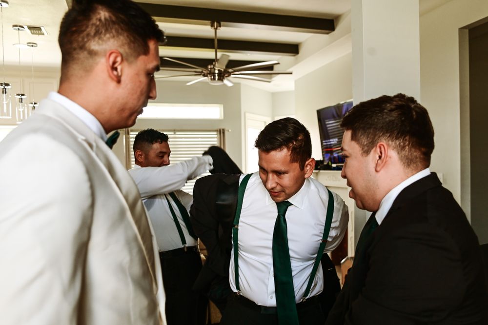 Wedding party preparing in formal attire during pre-ceremony moments.