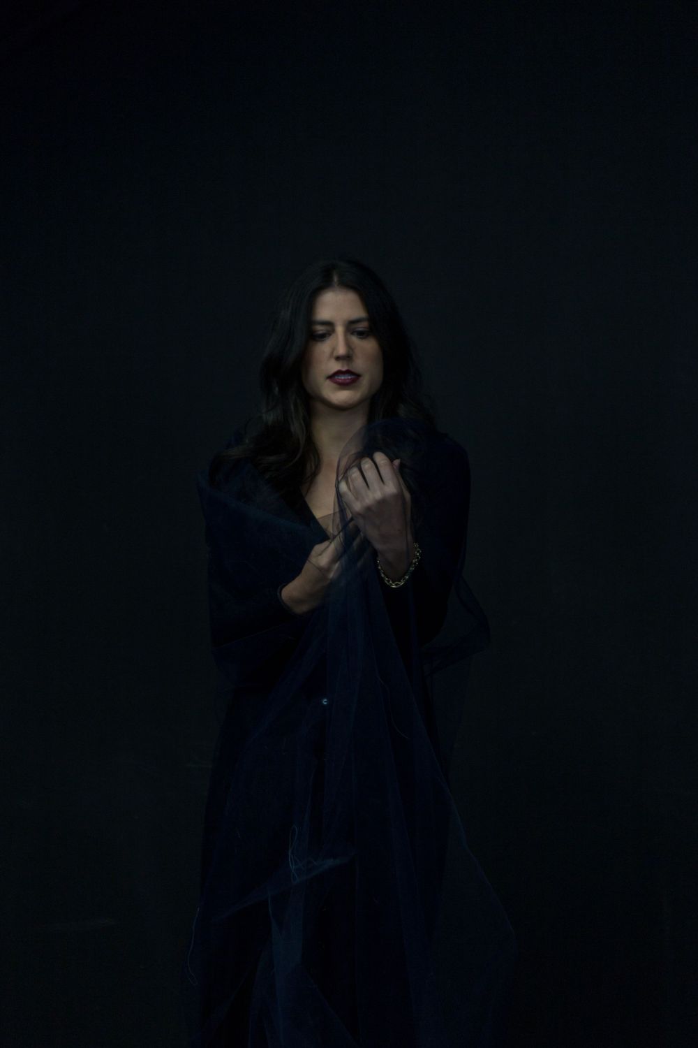 No Name Collective, Macbeth Theatre production promo photography. Dark, low lit moody image of Annaliese Kirby.
